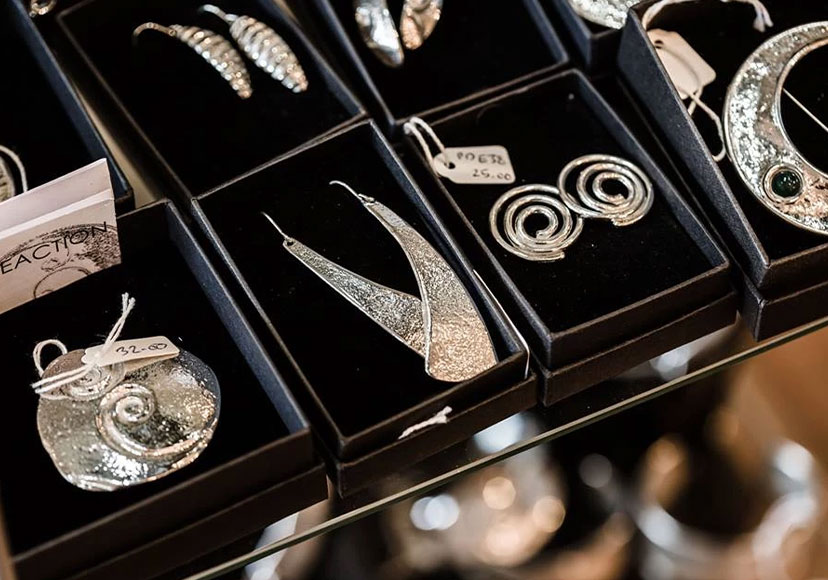 Various pewter jewellery on display at Glasson Craft Gallery.